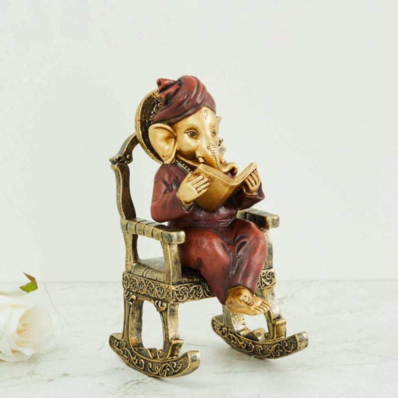 Home Centre Alpana Ganesha Sitting on Chair Figurine